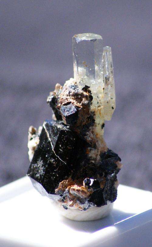 Aquamarine twin crystal on tourmaline crystals